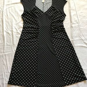 Black and white polkadots.knee length curve and comfortable fit midi dress.